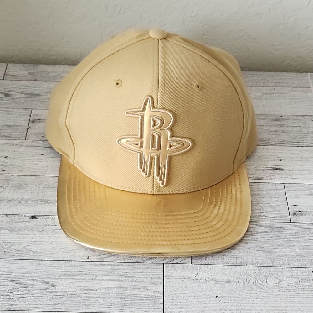 Mitchell & Ness Houston Rockets Beige & Gold DNA Snapback Cap